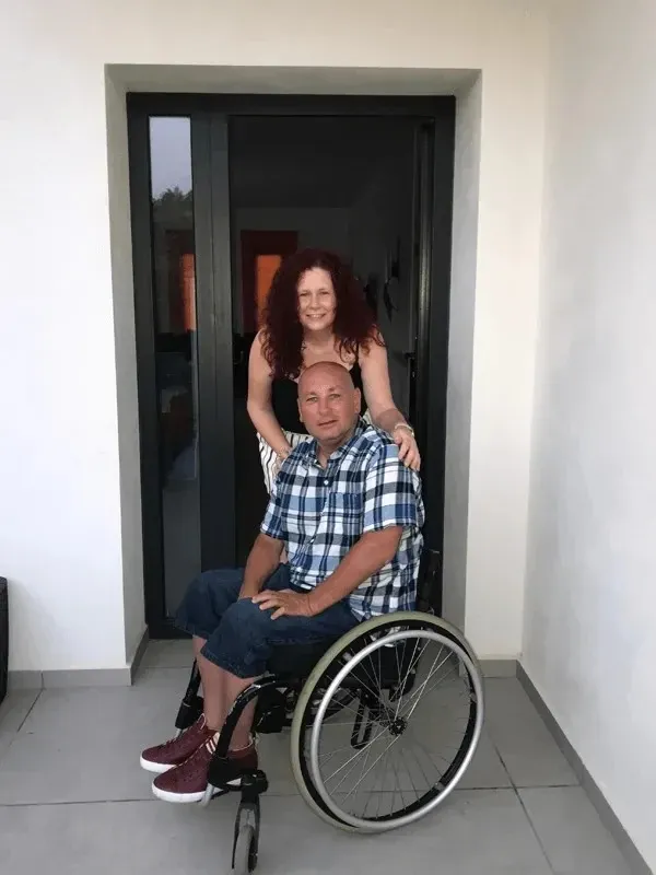 Lee and Clare, the owners, at the front door of Villa Olivo